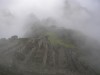 Machu Picchu appearing from the mist